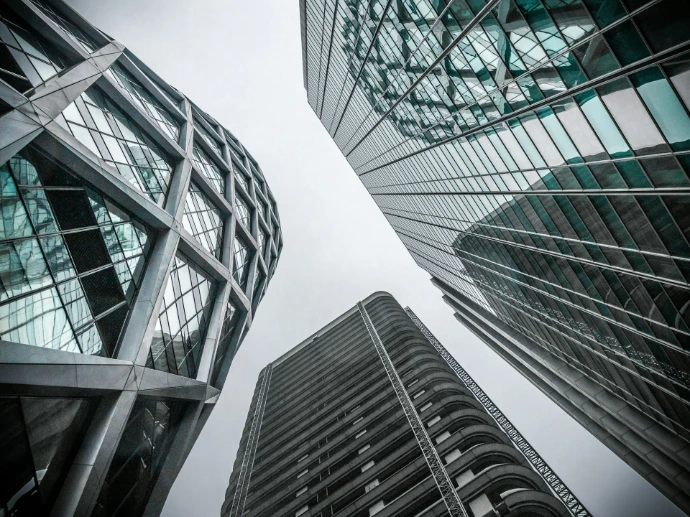 low angle photography of highrise buildings